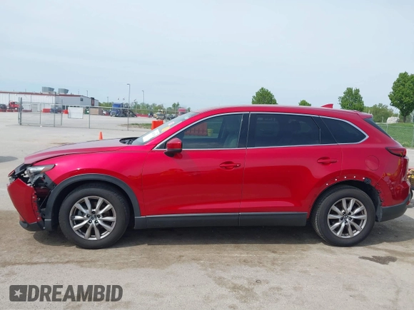 2016 Mazda CX-9 Touring with VIN JM3TCACY4G0112961, listed as a IAAI auction lot 42094718 with 114,679 mi miles and . Bid and sale history available at DreamBid. Image 14.