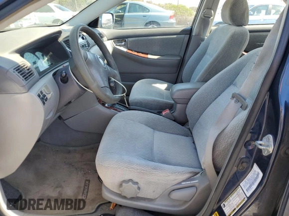 2004 Toyota Corolla CE with VIN 1NXBR38E84Z258728, listed as a Copart auction lot 45179905 with 148,530 mi miles and Salvage Title. Bid and sale history available at DreamBid. Image 7.