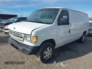 2002 Ford Econoline Cargo with VIN 1FTRE14252HB67887, listed as a IAAI auction lot 41180872 with 274,561 mi miles and . Bid and sale history available at carsss.com. Image 17.