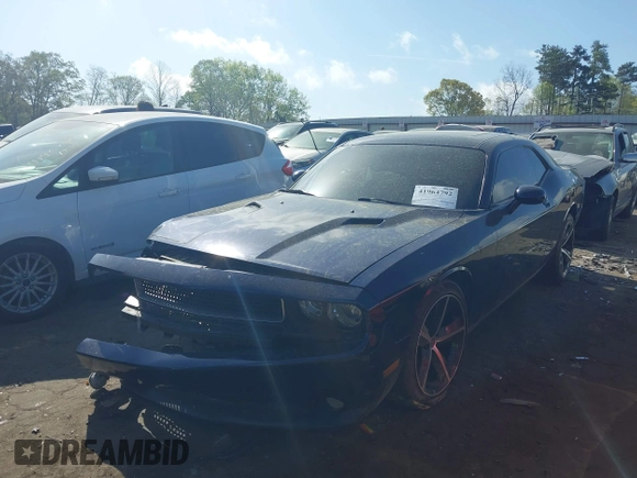 2013 Dodge Challenger SXT z VIN 2C3CDYAG2DH587643, wystawiony jako IAAI lot #41964792 z przebiegiem 179 791 mil mil oraz . Historia ofert i sprzedaży dostępna na DreamBid. Obrazek 17.