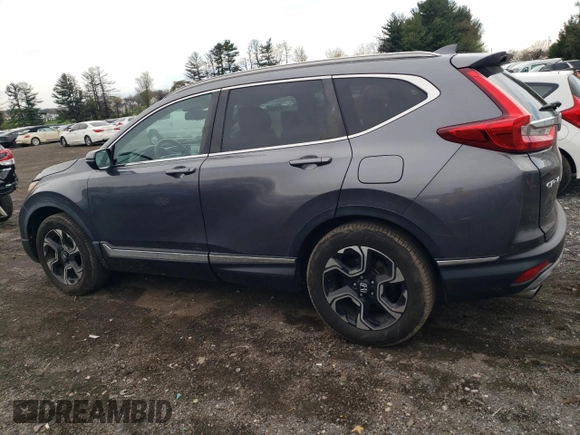 2017 Honda CR-V Touring with VIN 2HKRW2H90HH657450, listed as a Copart auction lot 52821895 with 154,801 mi miles and Salvage Title. Bid and sale history available at carsss.com. Image 2.