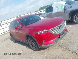 2016 Mazda CX-9 Touring z VIN JM3TCACY7G0116986, wystawiony jako IAAI lot #42140423 z przebiegiem 135 442 mil mil oraz . Historia ofert i sprzedaży dostępna na DreamBid. Obrazek 1.