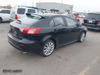 2010 Mitsubishi Lancer GTS with VIN JA32X8HWXAU004111, listed as a IAAI auction lot 41563303 with 198,931 mi miles. Bid and sale history available at carsss.com. Image 4.