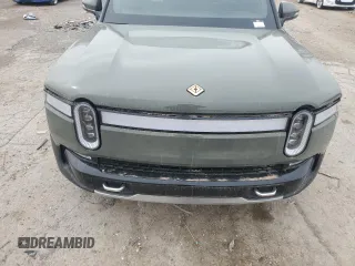 2022 Rivian R1T Launch Edition z VIN 7FCTGAAL2NN000433, wystawiony jako Copart lot #46680705 z przebiegiem Nie podano mil oraz Szkody całkowita. Historia ofert i sprzedaży dostępna na DreamBid. Obrazek 11.