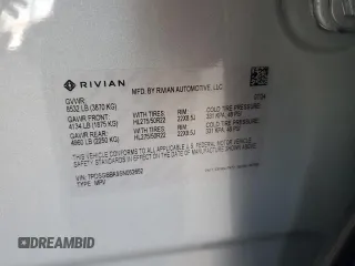 2025 Rivian R1S Adventure z VIN 7PDSGBBA9SN052652, wystawiony jako Copart lot #51659315 z przebiegiem 4012 mil mil oraz Szkody całkowita. Historia ofert i sprzedaży dostępna na DreamBid. Obrazek 15.