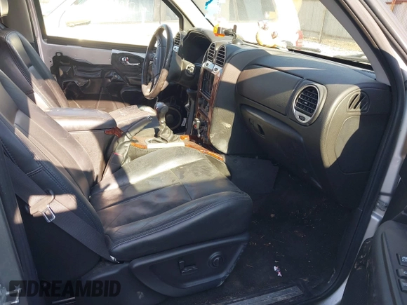 2005 GMC Envoy SLE with VIN 1GKDT13S952256293, listed as a IAAI auction lot 42048366 with 225,753 mi miles and . Bid and sale history available at DreamBid. Image 5.