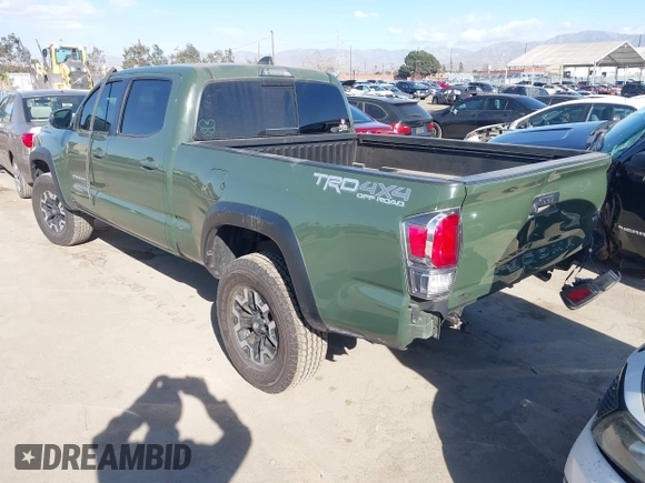 2021 Toyota Tacoma 4WD SR5 with VIN 3TMDZ5BN2MM101265, listed as a IAAI auction lot 41272874 with 51,989 mi miles. Bid and sale history available at carsss.com. Image 3.