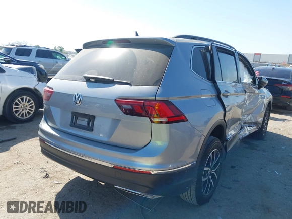 2021 Volkswagen Tiguan SE with VIN 3VV3B7AX0MM026064, listed as a IAAI auction lot 42038137 with 18,526 mi miles and . Bid and sale history available at DreamBid. Image 4.