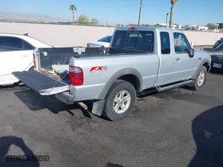 2003 Ford Ranger XL Fleet with VIN 1FTZR45EX3PA37013, listed as a IAAI auction lot 42088595 with 194,028 mi miles. Bid and sale history available at carsss.com. Image 4.