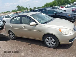 2006 Hyundai Accent GLS with VIN KMHCN46C26U037605, listed as a IAAI auction lot 42431996 with 86,128 mi miles and . Bid and sale history available at DreamBid. Image 13.