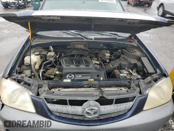 2002 Mazda Tribute LX with VIN 4F2YU09132KM45424, listed as a Copart auction lot 47778905 with 196,982 mi miles and Salvage Title. Bid and sale history available at carsss.com. Image 12.