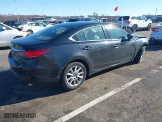 2015 Mazda Mazda6 i Sport with VIN JM1GJ1U60F1163055, listed as a IAAI auction lot 41587300 with 147,927 mi miles. Bid and sale history available at carsss.com. Image 4.