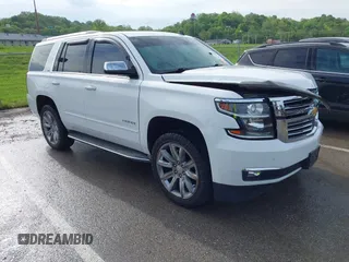 2015 Chevrolet Tahoe LTZ with VIN 1GNSKCKC0FR141545, listed as a IAAI auction lot 42136873 with 140,289 mi miles and . Bid and sale history available at DreamBid. Image 1.