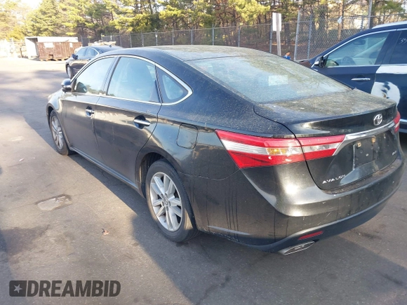 2013 Toyota Avalon XLE with VIN 4T1BK1EB8DU046429, listed as a IAAI auction lot 42092348 with 344,339 mi miles and . Bid and sale history available at DreamBid. Image 3.