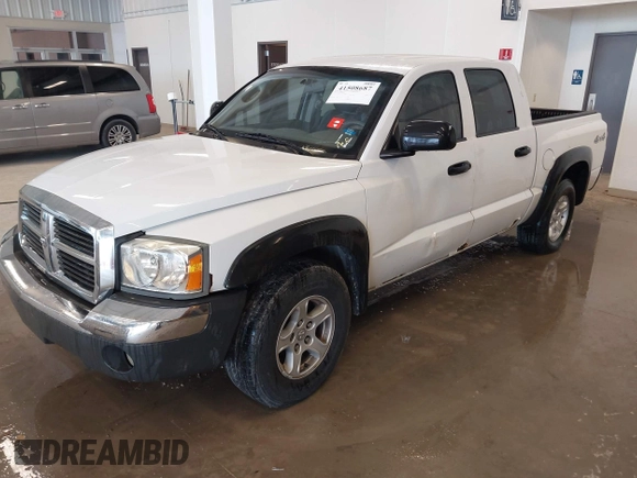 2005 Dodge Dakota SLT with VIN 1D7HW48N05S195964, listed as a IAAI auction lot 41508687 with 226,285 mi miles. Bid and sale history available at carsss.com. Image 2.