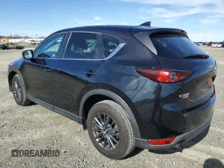 2019 Mazda CX-5 Touring with VIN JM3KFBCM3K1513233, listed as a Copart auction lot 45169645 with 45,492 mi miles and Salvage Title. Bid and sale history available at carsss.com. Image 2.