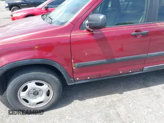 2002 Honda CR-V LX with VIN JHLRD68442C011268, listed as a IAAI auction lot 41962057 with 149,209 mi miles and . Bid and sale history available at carsss.com. Image 6.