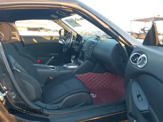 2015 Nissan 370Z Sport z VIN JN1AZ4EH5FM442339, wystawiony jako IAAI lot #42304030 z przebiegiem 73 272 mil mil oraz . Historia ofert i sprzedaży dostępna na DreamBid. Obrazek 5.