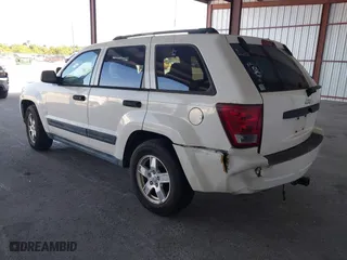 2005 Jeep Grand Cherokee Laredo with VIN 1J4GS48K15C536705, listed as a IAAI auction lot 41800947 with 0 mi miles. Bid and sale history available at carsss.com. Image 3.