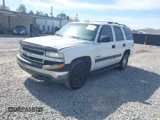2002 Chevrolet Tahoe LS with VIN 1GNEC13V52J284059, listed as a IAAI auction lot 41899231 with 390,173 mi miles. Bid and sale history available at carsss.com. Image 2.
