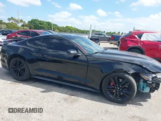 2015 Ford Mustang EcoBoost z VIN 1FA6P8TH4F5346981, wystawiony jako IAAI lot #42152465 z przebiegiem 63 862 mil mil oraz . Historia ofert i sprzedaży dostępna na DreamBid. Obrazek 1.
