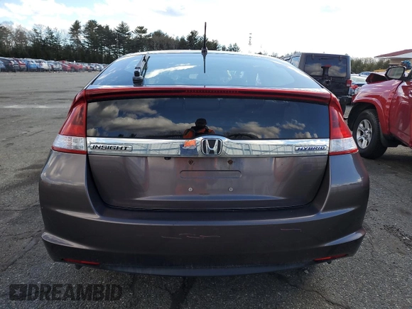 2012 Honda Insight EX z VIN JHMZE2H77CS002731, wystawiony jako Copart lot #47240475 z przebiegiem 139 627 mil mil oraz Szkoda całkowita • Salvage title. Historia ofert i sprzedaży dostępna na DreamBid. Obrazek 6.