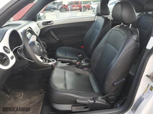 2012 Volkswagen Beetle 2.5L PZEV with VIN 3VWJP7ATXCM606633, listed as a Copart auction lot 85889244 with 80,652 mi miles and Salvage Title. Bid and sale history available at carsss.com. Image 7.
