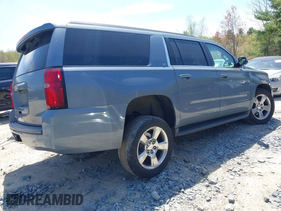 2016 Chevrolet Suburban LT z VIN 1GNSKHKC4GR427591, wystawiony jako IAAI lot #42162723 z przebiegiem 131 771 mil mil oraz . Historia ofert i sprzedaży dostępna na DreamBid. Obrazek 4.