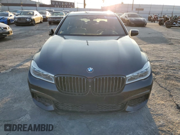 2017 BMW 7 Series 750i with VIN WBA7F0C57HGM21136, listed as a Copart auction lot 88525335 with 102,508 mi miles and Salvage title. Bid and sale history available at DreamBid. Image 5.