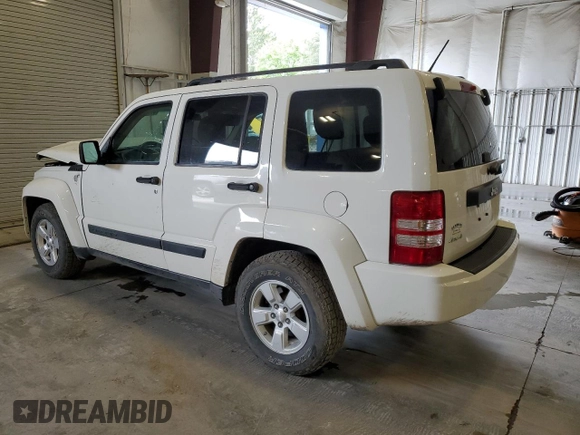 2010 Jeep Liberty Sport with VIN 1J4PN2GK2AW115064, listed as a Copart auction lot 57344645 with 114,275 mi miles and Salvage title. Bid and sale history available at DreamBid. Image 2.