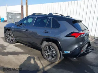 2021 Toyota RAV4 Prime XSE with VIN JTMFB3FV7MD009740, listed as a IAAI auction lot 41666510 with 59,950 mi miles. Bid and sale history available at carsss.com. Image 3.