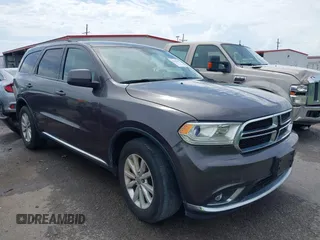 2014 Dodge Durango SXT with VIN 1C4RDHAG3EC543256, listed as a IAAI auction lot 42442851 with 73,609 mi miles and . Bid and sale history available at DreamBid. Image 1.