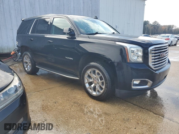 2017 GMC Yukon SLE with VIN 1GKS1AKC3HR307466, listed as a Copart auction lot 77559704 with 130,274 mi miles and Salvage Title. Bid and sale history available at carsss.com. Image 4.