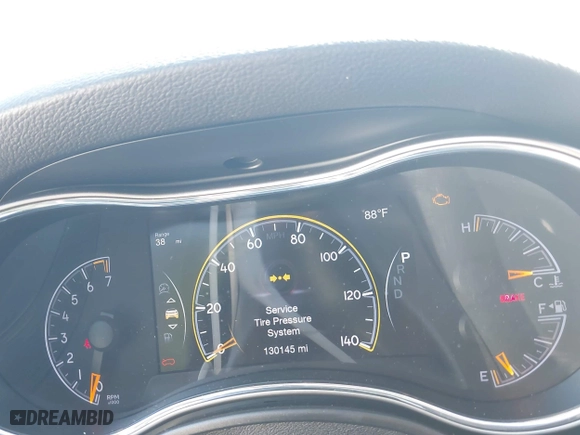 2018 Jeep Grand Cherokee Laredo E with VIN 1C4RJFAG0JC284927, listed as a IAAI auction lot 41964013 with 130,145 mi miles. Bid and sale history available at carsss.com. Image 7.