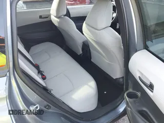 2023 Toyota Corolla Cross L with VIN 7MUAAAAG4PV044969, listed as a IAAI auction lot 42388727 with 26,071 mi miles and . Bid and sale history available at DreamBid. Image 8.