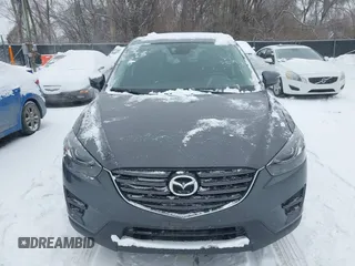 2016 Mazda CX-5 Grand Touring with VIN JM3KE4DY2G0913412, listed as a IAAI auction lot 41616132 with 85,166 mi miles. Bid and sale history available at carsss.com. Image 12.