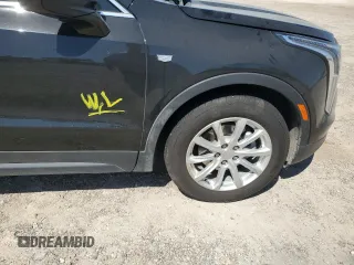 2023 Cadillac XT4 FWD Luxury z VIN 1GYAZAR46PF178003, wystawiony jako Copart lot #52024665 z przebiegiem 42 000 mil mil oraz Szkoda całkowita • Salvage title. Historia ofert i sprzedaży dostępna na DreamBid. Obrazek 13.