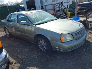 2005 Cadillac DeVille with VIN 1G6KD54YX5U164532, listed as a IAAI auction lot 41784521 with 999,999 mi miles. Bid and sale history available at carsss.com. Image 1.