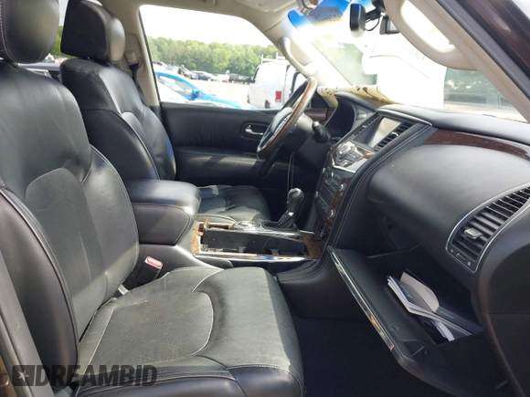 2016 Infiniti QX80 with VIN JN8AZ2ND8G9800914, listed as a IAAI auction lot 42204257 with 113,149 mi miles and . Bid and sale history available at DreamBid. Image 5.