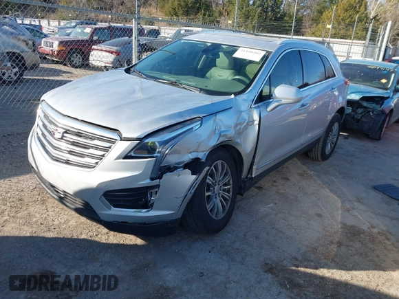 2019 Cadillac XT5 Luxury FWD with VIN 1GYKNCRSXKZ100695, listed as a IAAI auction lot 41108502 with 94,617 mi miles and . Bid and sale history available at DreamBid. Image 2.