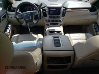 2015 GMC Yukon Denali with VIN 1GKS2CKJXFR702247, listed as a Copart auction lot 51648175 with 151,936 mi miles and Salvage Title. Bid and sale history available at carsss.com. Image 8.