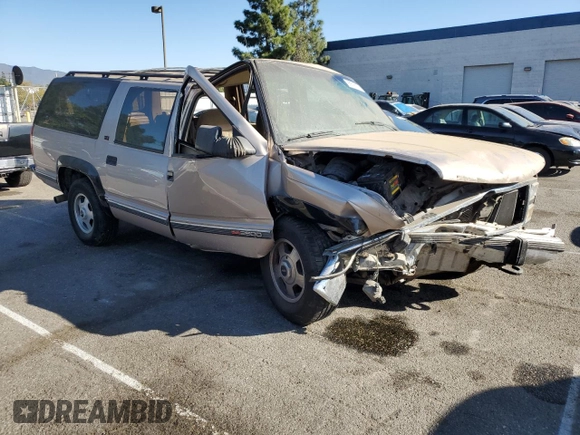 1993 GMC Suburban z VIN 1GKGK26NXPJ711771, wystawiony jako Copart lot #85515174 z przebiegiem 63 064 mil mil oraz Szkoda całkowita • Salvage title. Historia ofert i sprzedaży dostępna na DreamBid. Obrazek 4.
