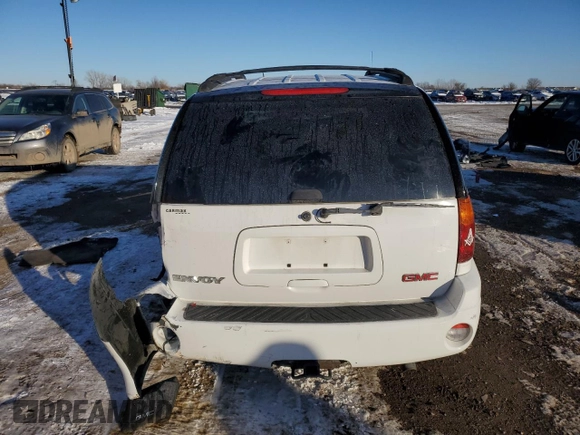 2005 GMC Envoy SLT with VIN 1GKDS13S052231236, listed as a Copart auction lot 45741075 with 116,678 mi miles and Salvage Title. Bid and sale history available at carsss.com. Image 6.