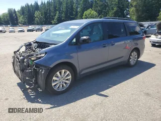 2015 Toyota Sienna LE with VIN 5TDJK3DC1FS128144, listed as a Copart auction lot 60254475 with 109,782 mi miles and Salvage title. Bid and sale history available at DreamBid. Image 1.
