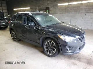 2016 Mazda CX-5 Grand Touring with VIN JM3KE4DY3G0859067, listed as a Copart auction lot 49759775 with 92,928 mi miles and Salvage Title. Bid and sale history available at carsss.com. Image 4.