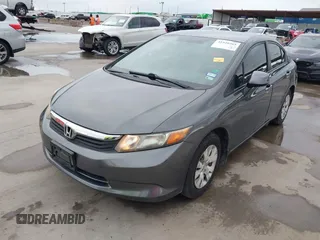 2012 Honda Civic LX z VIN 2HGFB2F51CH600546, wystawiony jako IAAI lot #41920265 z przebiegiem 196 599 mil mil oraz . Historia ofert i sprzedaży dostępna na DreamBid. Obrazek 2.