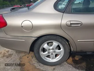 2003 Ford Taurus SE Standard with VIN 1FAFP53U63G125751, listed as a IAAI auction lot 41933803 with 196,710 mi miles. Bid and sale history available at carsss.com. Image 18.