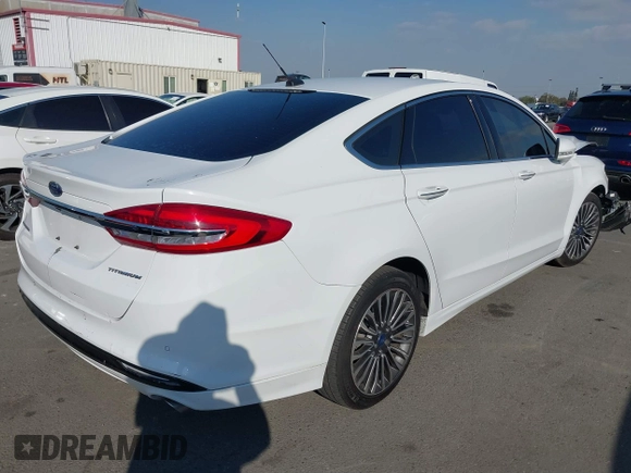 2018 Ford Fusion Titanium with VIN 3FA6P0RU0JR117158, listed as a IAAI auction lot 41435172 with 98,390 mi miles and . Bid and sale history available at DreamBid. Image 4.