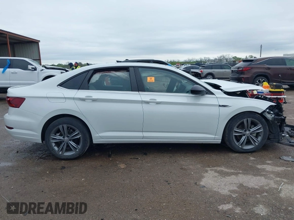 2021 Volkswagen Jetta S z VIN 3VWC57BUXMM017430, wystawiony jako IAAI lot #41947038 z przebiegiem 50 277 mil mil oraz . Historia ofert i sprzedaży dostępna na DreamBid. Obrazek 14.