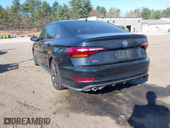 2019 Volkswagen Jetta GLI S z VIN 3VW5T7BU1KM156888, wystawiony jako IAAI lot #40778065 z przebiegiem 97 114 mil mil oraz . Historia ofert i sprzedaży dostępna na DreamBid. Obrazek 3.